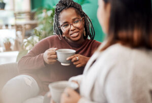 Woman drinking CBD Coffee