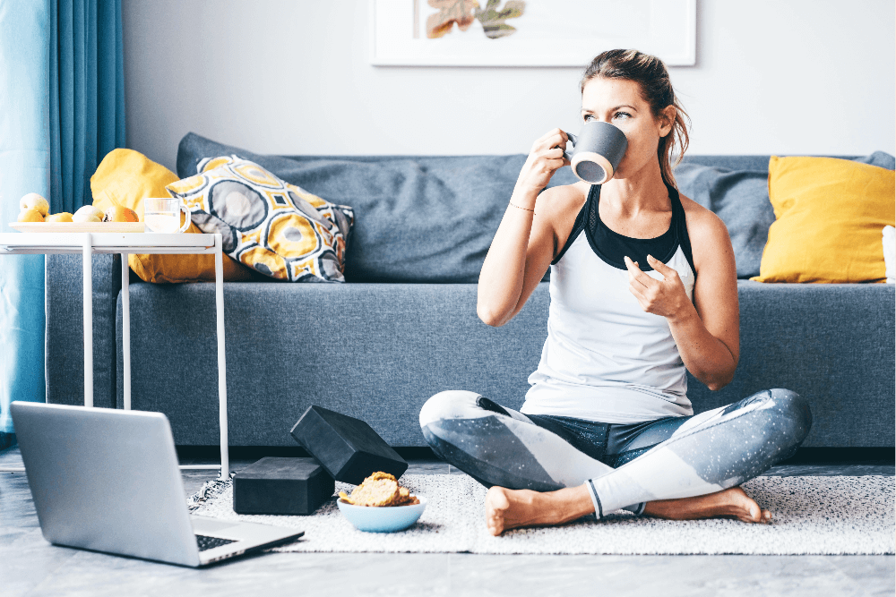 Woman drinking CBD Coffee after working out