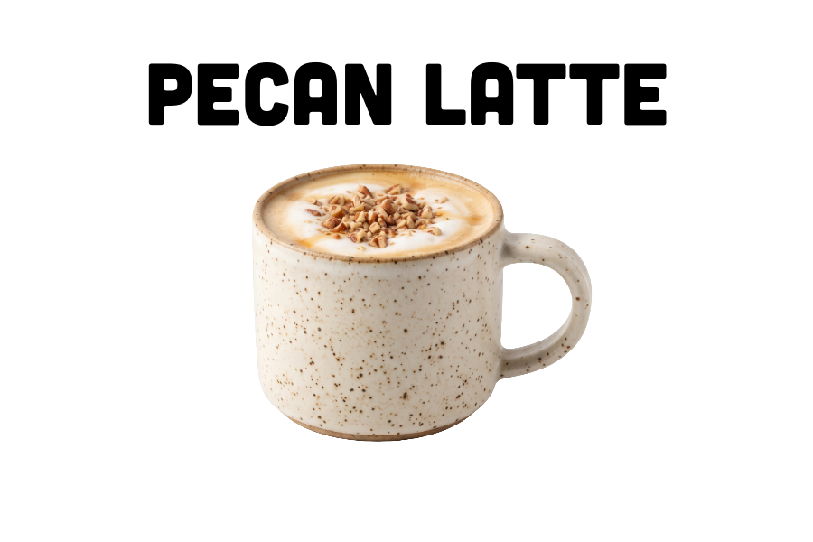 Pecan syrup latte topped with cinnamon beside a jar of homemade pecan syrup